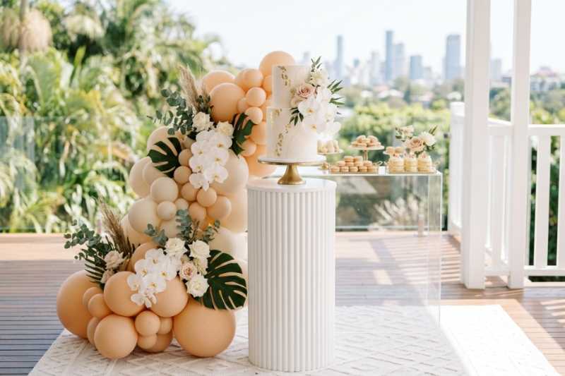 A styled dessert table and florals by The Balloon Stylist